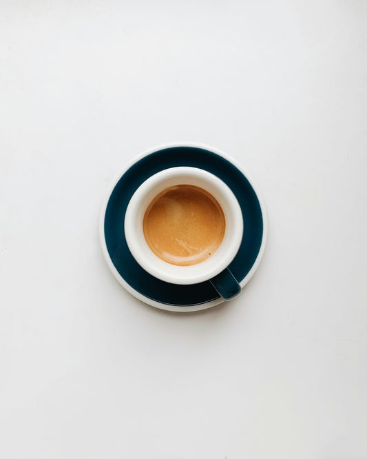 cup of coffee on top of saucer