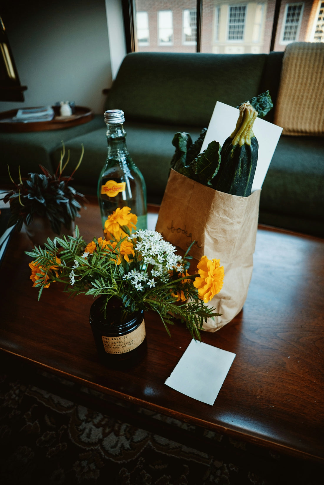 a vase with flowers on a table