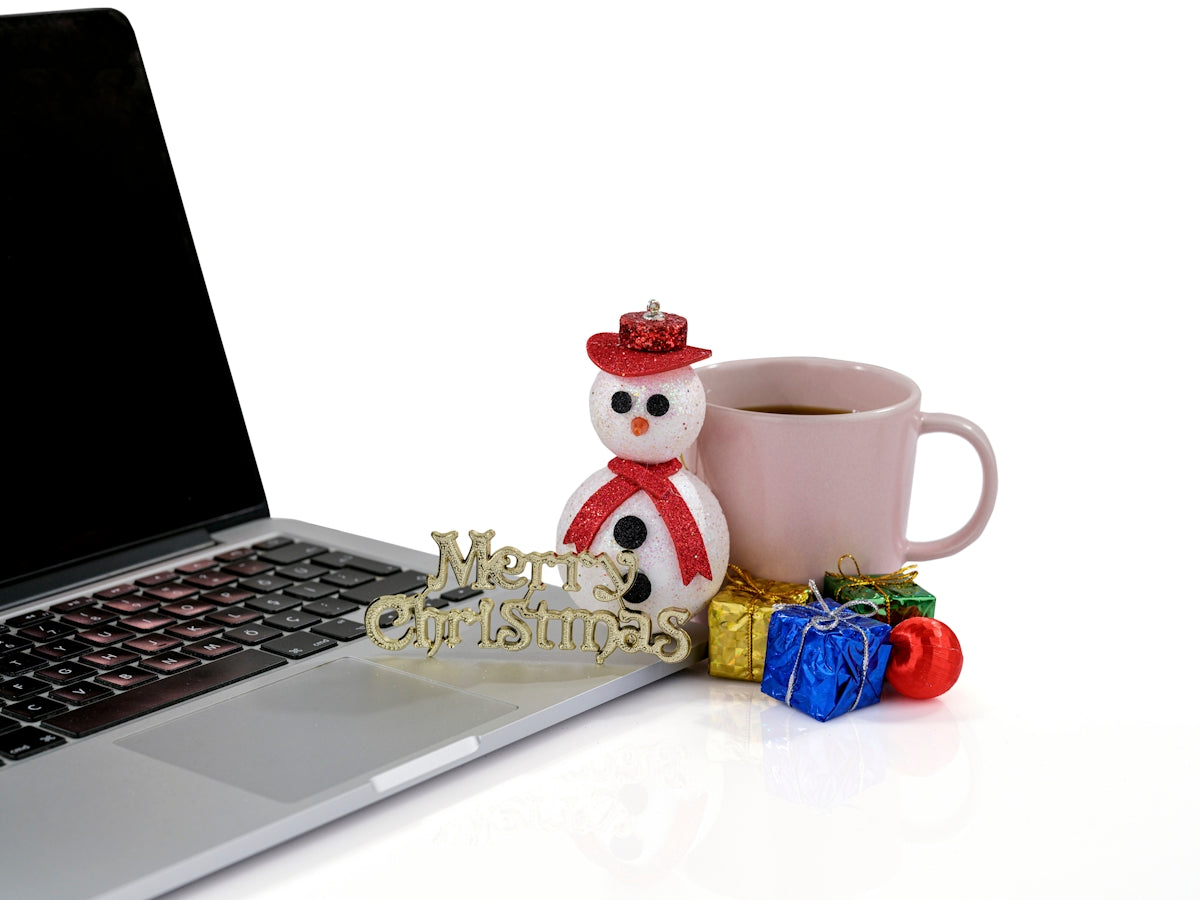 a laptop and a cup of coffee