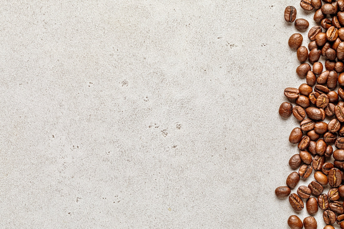 a pile of coffee beans sitting on top of a table