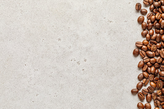 a pile of coffee beans sitting on top of a table