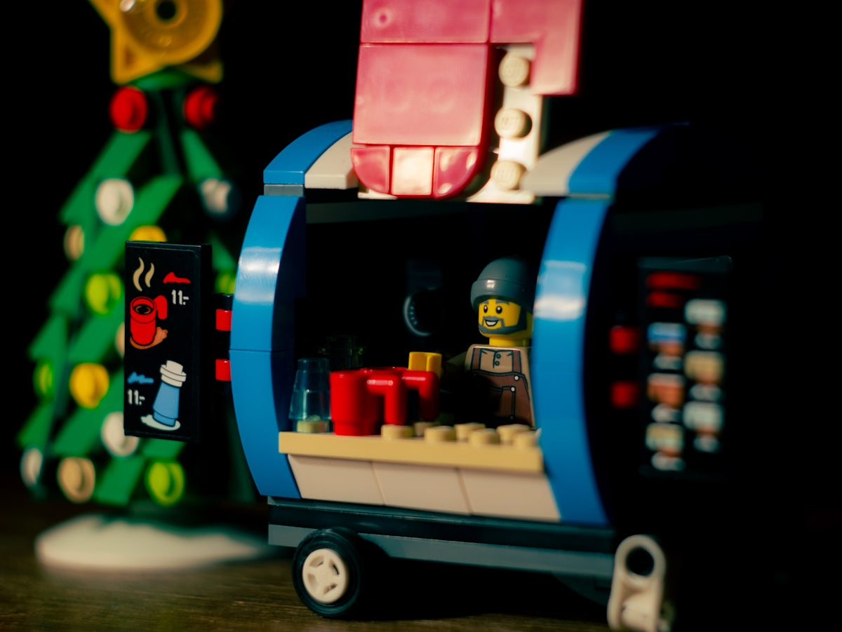 a toy car with a christmas tree in the back